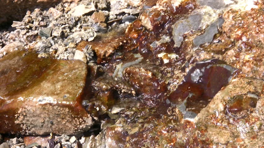water on gold stone 