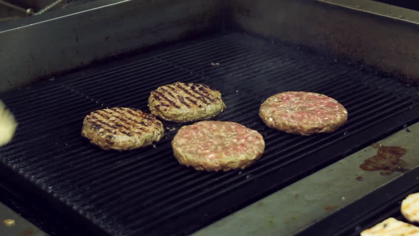 Making burgers on the grill
