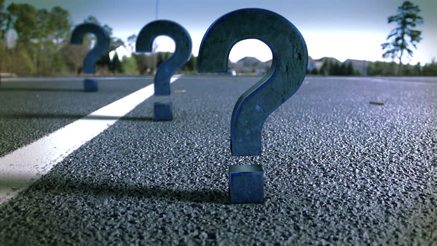 Question marks in the road.