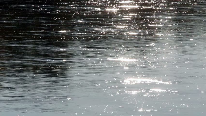 Sunlight shimmers on the Missouri River at the Upper Missouri River Breaks National Monument, Montana, USA