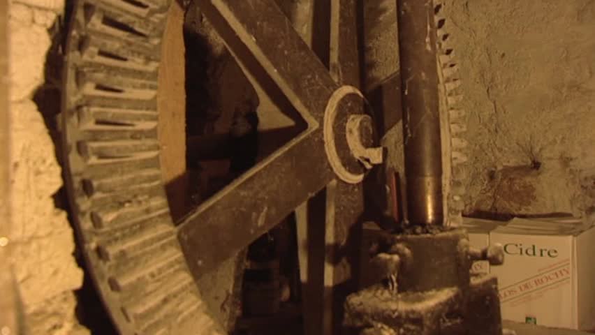 iron wheel turning in historical gristmill