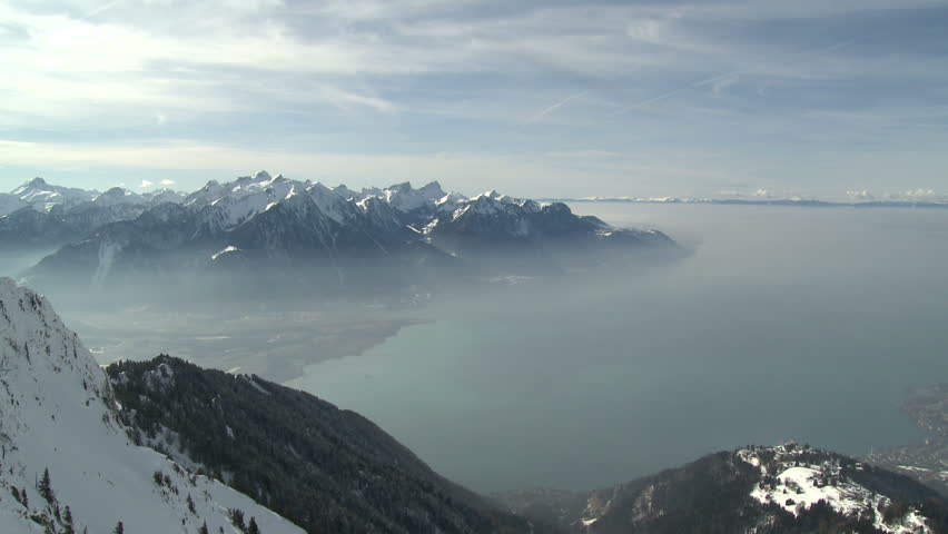 Amazing high altitude view over Lake Geneva in Switzerland shot from about 6,500ft. Includes inversion layer of haze trapped at lower altitude. Shot in full HD 1920x1080 30p on Sony EX1