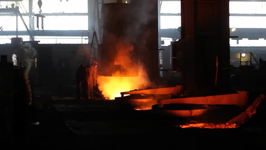 Putting iron in the furnace to melt, foundry, smelting iron and processing