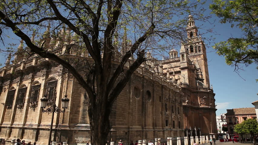 View of the famous Seville mosche with its Giralda minaret in a typical day