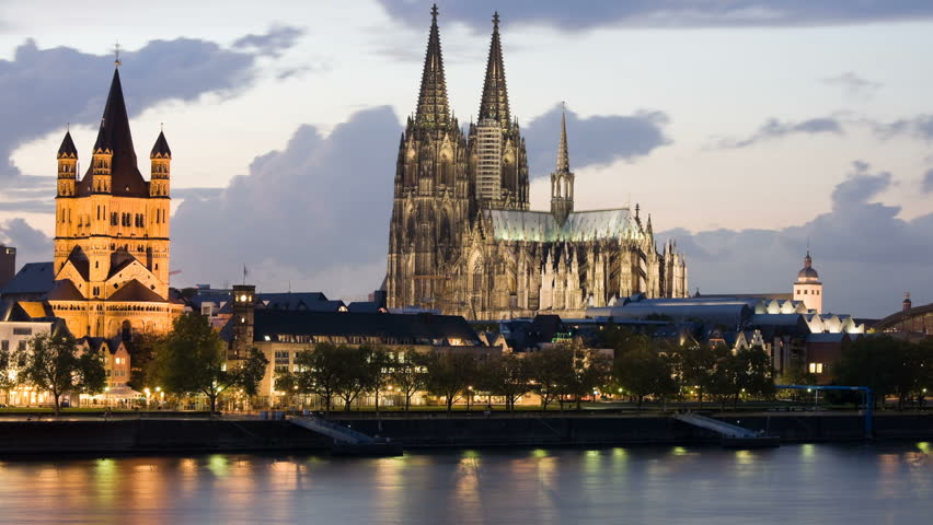 Cologne panorama at dusk with clouds and night illumination. Time lapse. HD full 1920x1080 30fps shot by high resolution camera, 4:4:4 - no compression, progressive scan, ready for HQ post production.