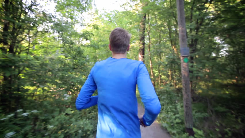 Man running through the forest