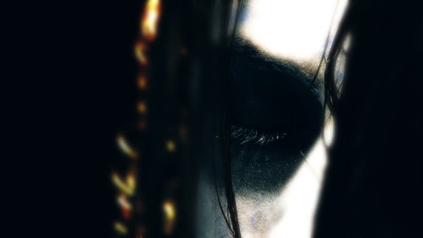 possessed by a demon a girl opens her eyes to reveal the evil within