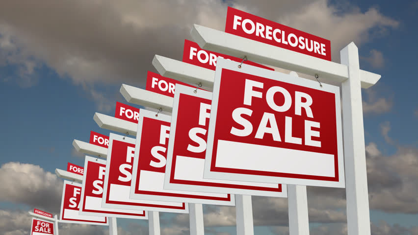 Foreclosure Real Estate Signs Lining Up into the horizon on a Time-lapse Cloudy Sky Background.