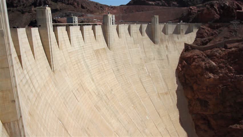 Hoover Dam, once known as Boulder Dam. Hoover Dam is a concrete arch-gravity dam in the Black Canyon of the Colorado River, on the border between the US states of Arizona and Nevada.