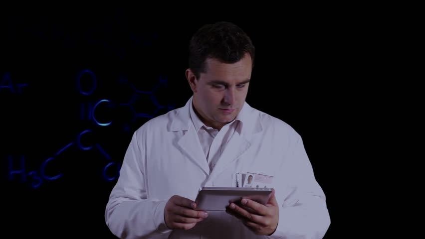 Scientist using Tablet PC with Scientific Chemistry Background
