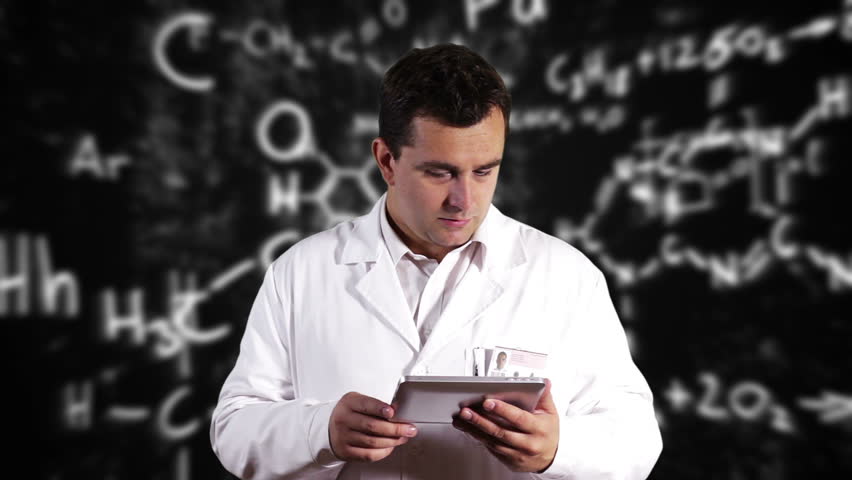 Scientist using Tablet PC with Scientific Chemistry Background