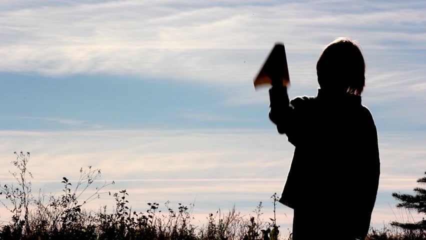 boy with paper airplane 