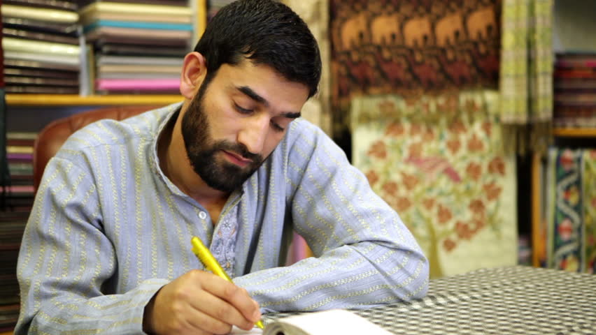 Asian male beauty. Seller of Pashmina originally from Kashmir.