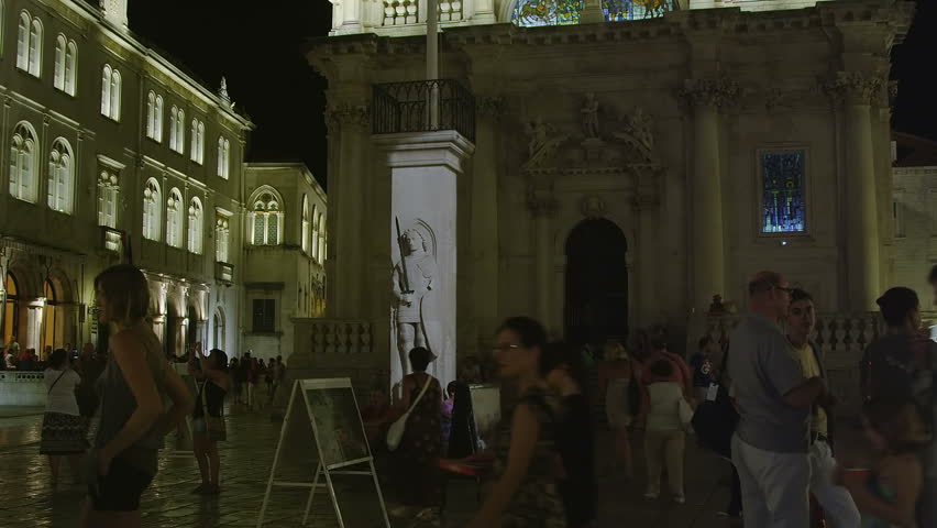 Dubrovnik Orlando's Column from Renaissance period - humanism in front of St. Blasius church by night.
