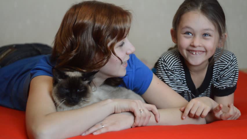 mother and daughter talking and laughing