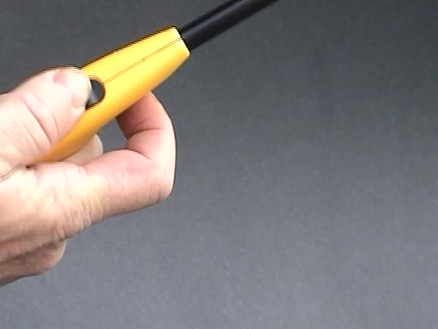 Big Close Up "aka BCU" of a human hand lighting a propane lighter with his hand With Sound