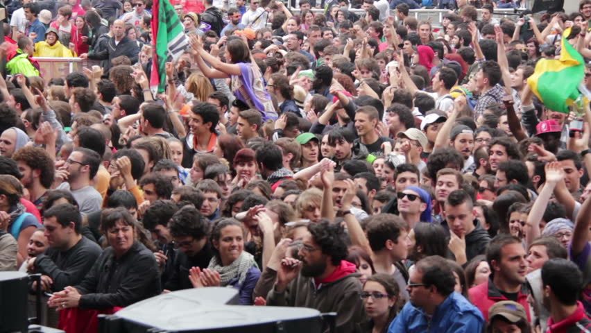 ROME, ITALY - MAY 1: People attend free "Concerto del Primo Maggio" ("Workers' Day Concert") in Piazza San Giovanni (San Giovanni Square) on Workers' Day, May 1, 2012 in Rome, Italy.