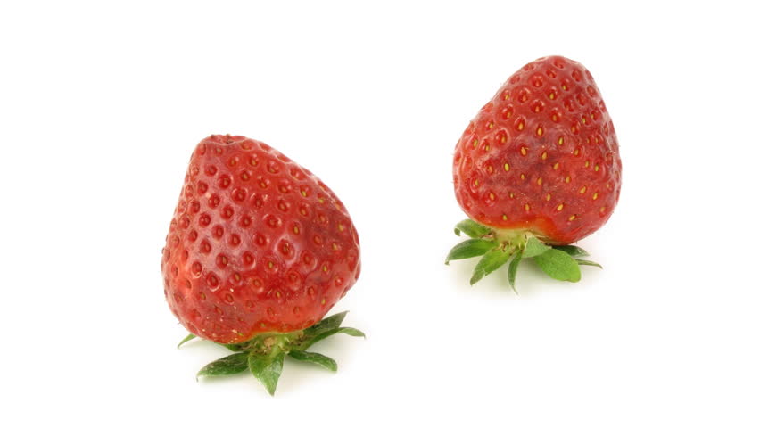 Timelapse of strawberries rotting over white background