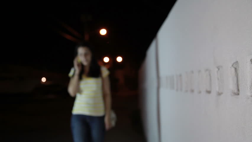 girl walking late at night, being watched by mugger, mugger runs out and takes her purse