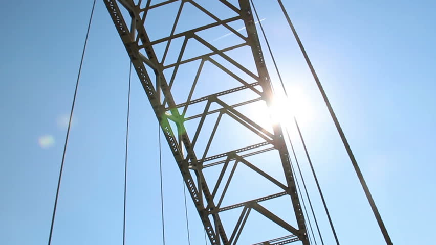 Looking up at the beams that make up the arch of the West End Bridge over the Ohio River in Pittsburgh, Pennsylvania.