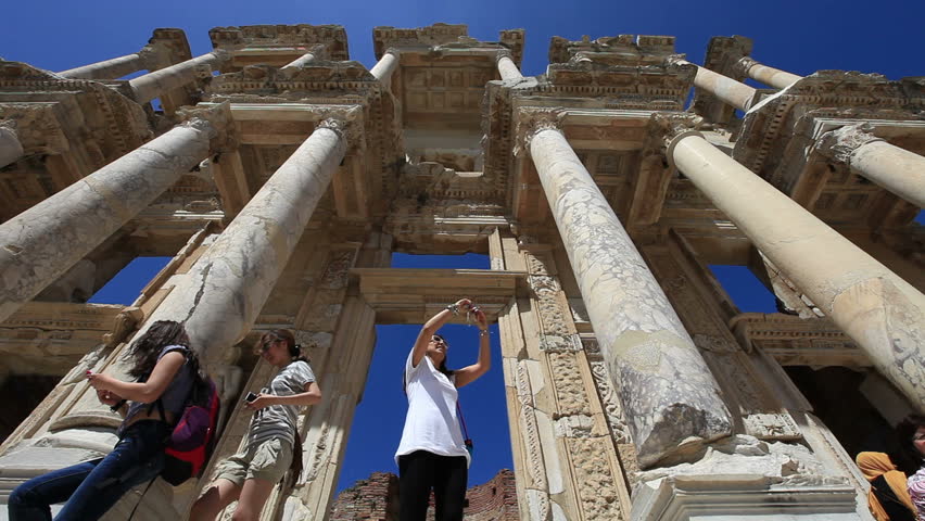 SELCUK, TURKEY - JUNE 10: People visit Celsus library in Ephesus and tourists on June 10 2012 in Selcuk. 
               
