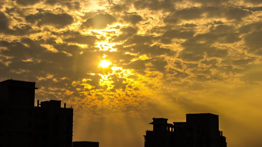 Cloudy Sunset with Light Rays in Shanghai, China. Photo Sequence from DSLR camera and Post production in After Effects