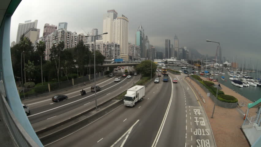 motion cars go through the city street 