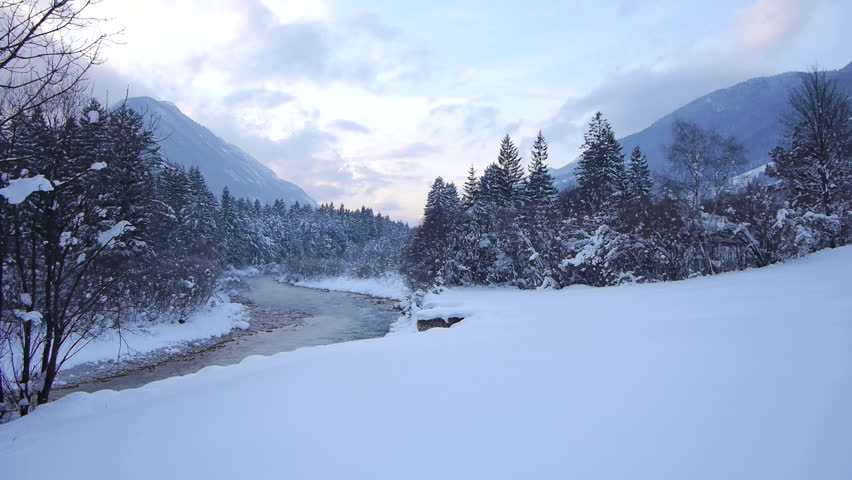 AERIAL: Misty river in winter