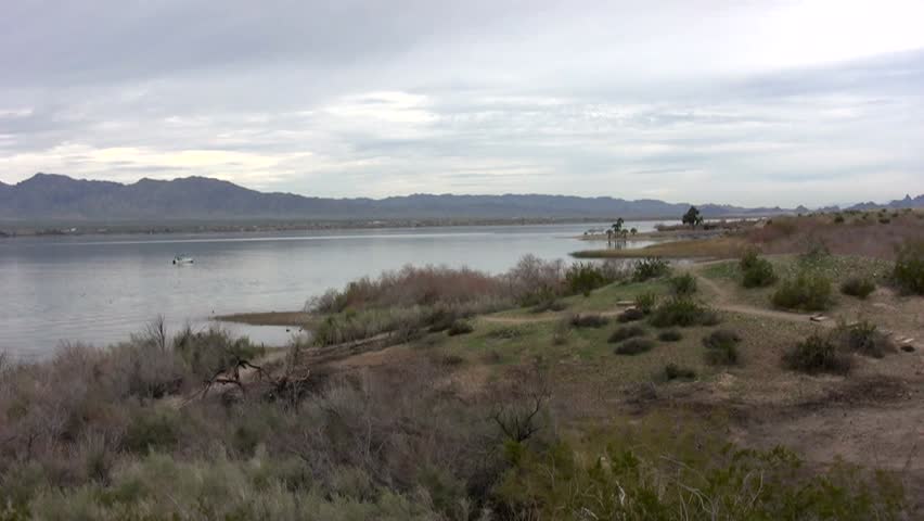 HD clip of a slow pan from left to right across Lake Havasu, Arizona on a calm, cloudy day