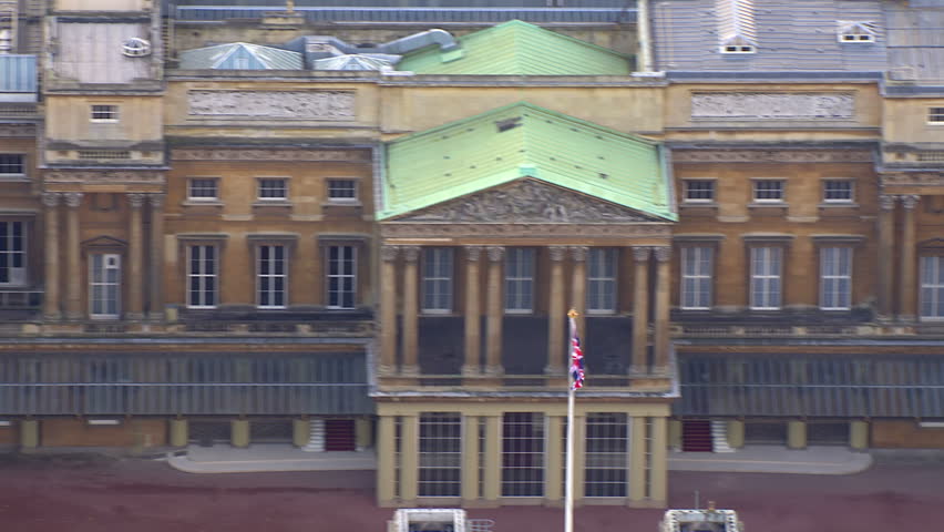 LONDON - NOVEMBER 2012: Aerial view over the courtyard at Buckingham palace in London. The union flag is being flown to signify that the queen is not in residence. London, UK. 22 November 2012