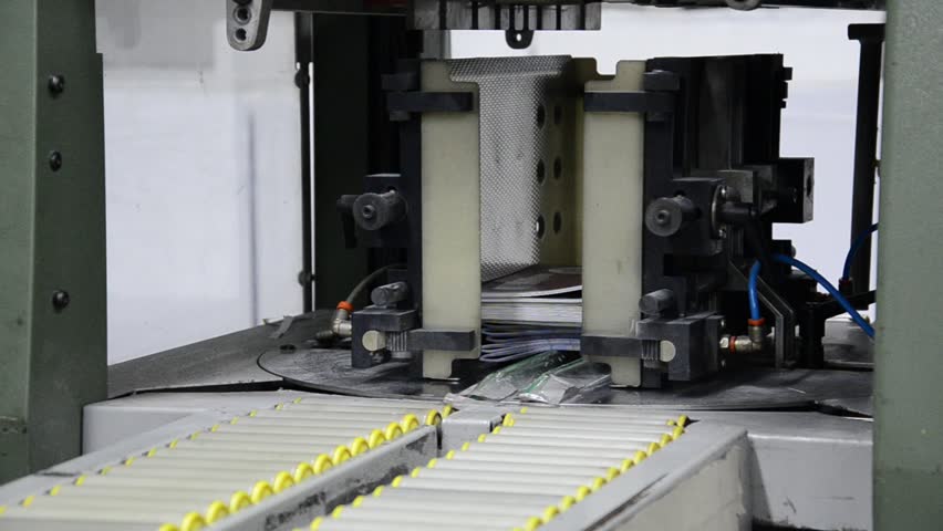 print house product collector, offset, web magazine, newspaper industrial stitching machine final product delivery line.