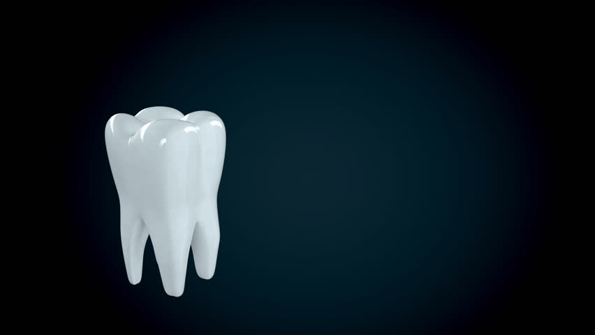 Close-up of treating unhealthy tooth with a drill.