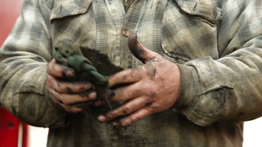 Dirty hands of auto mechanic
