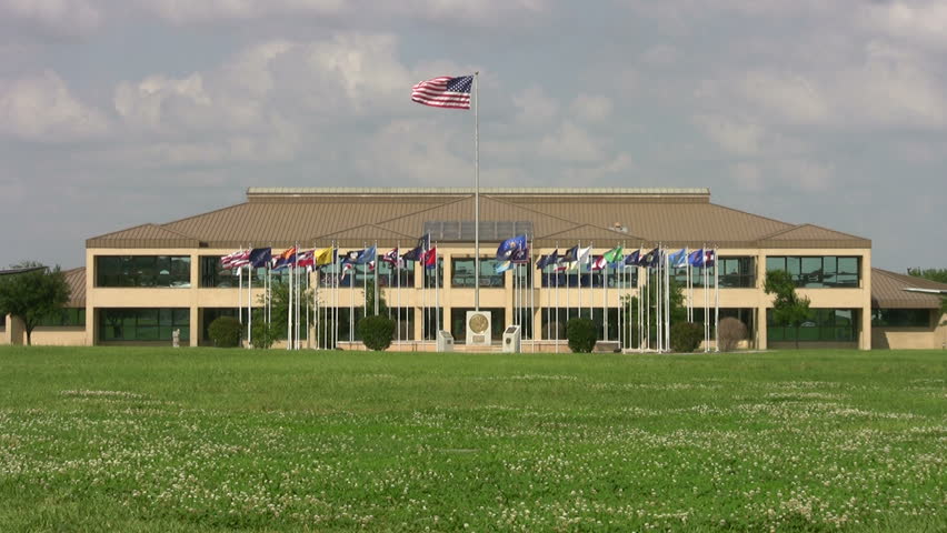 Video of lackland AFB parade Ground for Basic training. Headquarter Building with circle of flags. Don Despain of Rekindle Photo