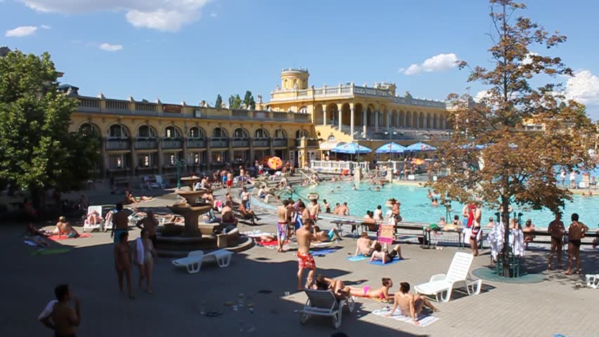BUDAPEST, HUNGARY - JULY 10: People bath in the Szechenyi spa on July 10, 2012 in Budapest, Hungary. Szechenyi Medicinal Bath is the largest medicinal bath in Europe. 