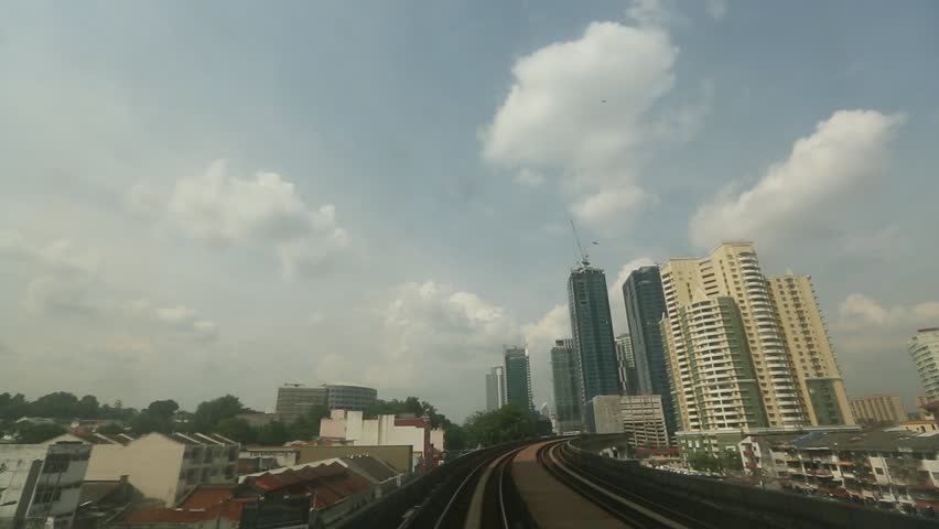 KUALA LUMPUR, MALAYSIA - APR 4: View of the city from Kelana Jaya Line on April 4, 2013 in Kuala Lumpur. Today KJL carries over 190,000 passengers a day and over 350,000 a day during national events.