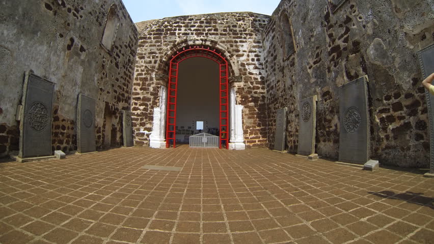 MALACCA - MARCH 26: time lapse  of tourists looking at the tombstones in   st Paul church in Malacca Malaysia 26th March 2013