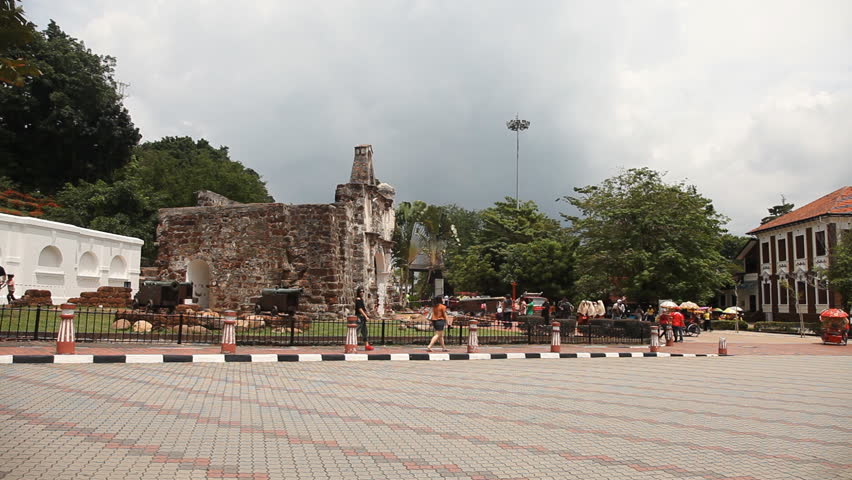 MALACCA 4 November: time lapse of trishaw driving in front of A Famosa Malacca in Malaysia on 4th November 2012
