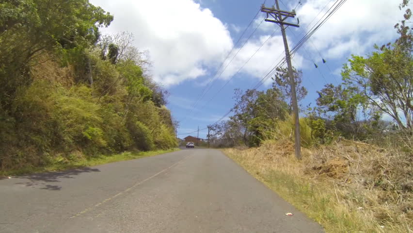 COSTA RICA - MAR 2013: Vehicle shot of driving through central Costa Rica along highway 142 in March, 2013.