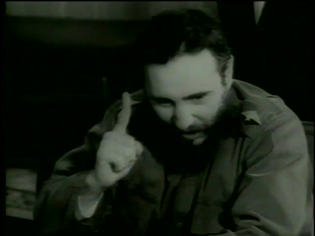 Fidel Castro smokes a russian cigar at the meeting with First Secretary of the Communist Party Nikita Khrushchev in Moscow circa 1964-MGM PICTURES,UNIVERSAL-INTERNATIONAL NEWSREEL, USA, filmed in 1964