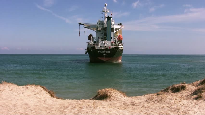 VALENCIA, SPAIN - OCTOBER 01: The cargo ship âBSLE SUNRISEâ is aground on El Saler Beach after the strong storm when the boat was anchored close to Valencia port, on october 01, 2012 in Valencia.