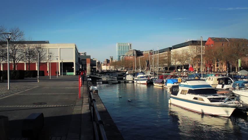 BRISTOL - April 6: People Walking by Bristol Harbour Side on Sunny Day on April 6, 2013 in Bristol, England.