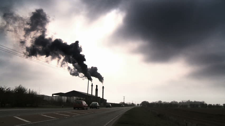Smoking chimneys polluting the air