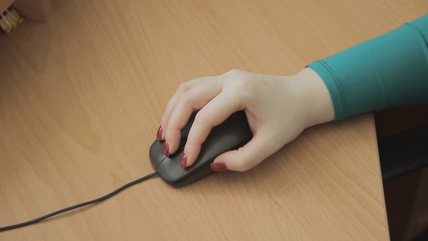 girl's hand working the mouse
