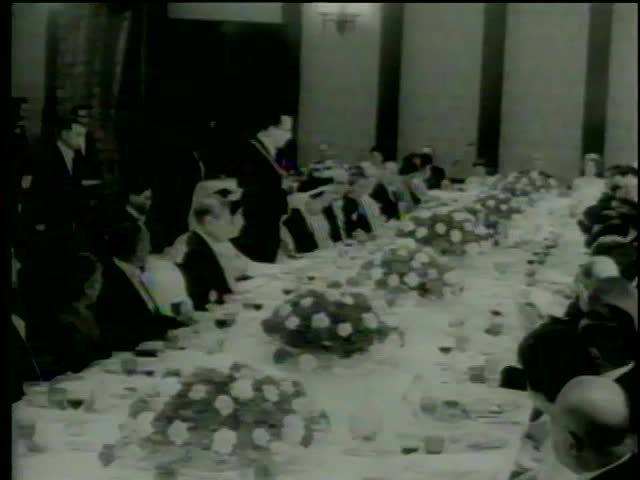 King Baudouin of Belgium makes a toast at the dinner with Emperor and Empress of Japan in Imperial Banquet Hall, Tokyo circa 1964-MGM PICTURES, UNIVERSAL-INTERNATIONAL NEWSREEL, USA, filmed in 1964