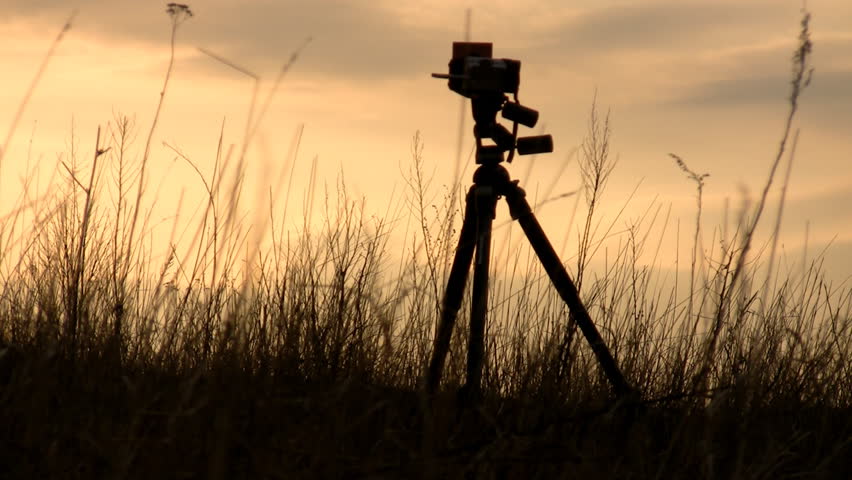 Evening silhouette of the chamber established on a tripod. 