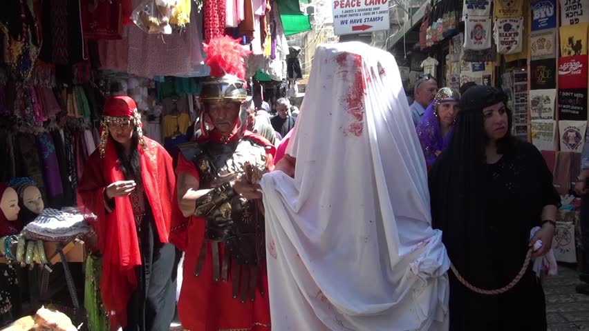JERUSALEM-MARCH 29: Catholic Holy Friday - a group of actors depicting the crucifixion of Christ near Holy Sepulcher in Old City Jerusalem, Holy Friday March 29, 2013 in Jerusalem, Israel