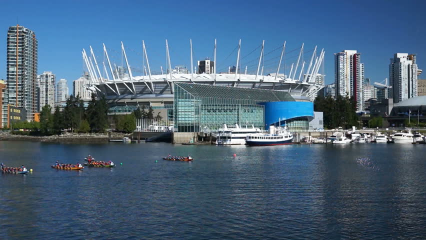 VANCOUVER, CANADA â May 05, 2013: Rowers take part in dragon boat race at False Creek in Vancouver on May 05, 2013. Dragon boating today is the fastest growing international team water sport.