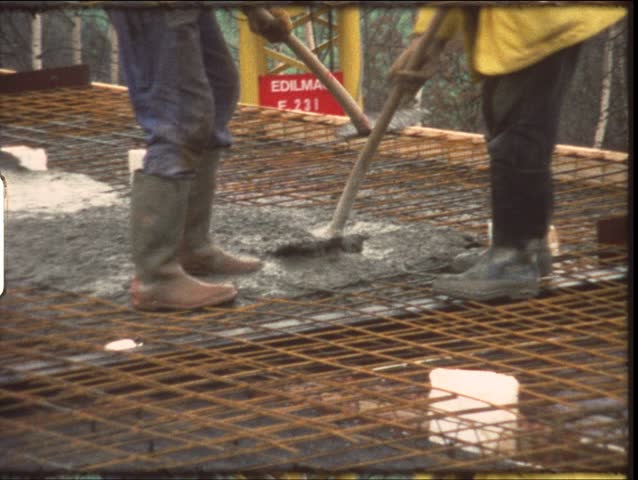 Vintage 8mm film: Housebuilding, pouring concrete