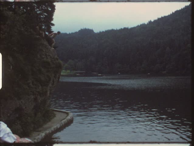 Vintage 8mm film: Children jumping in lake
